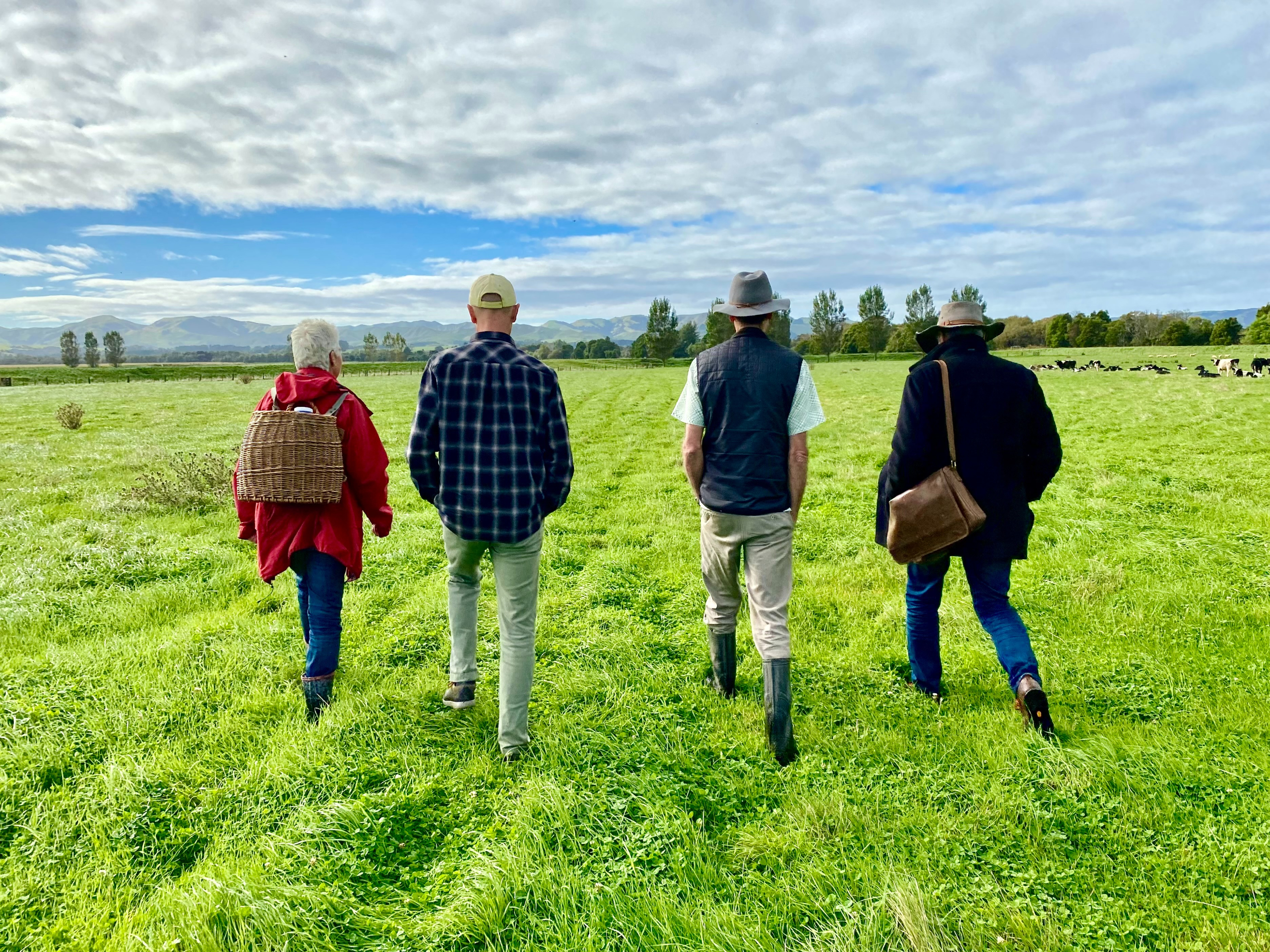 Jane Riddiford (left) takes the trustees on a tour of the Ruamāhanga Farm
