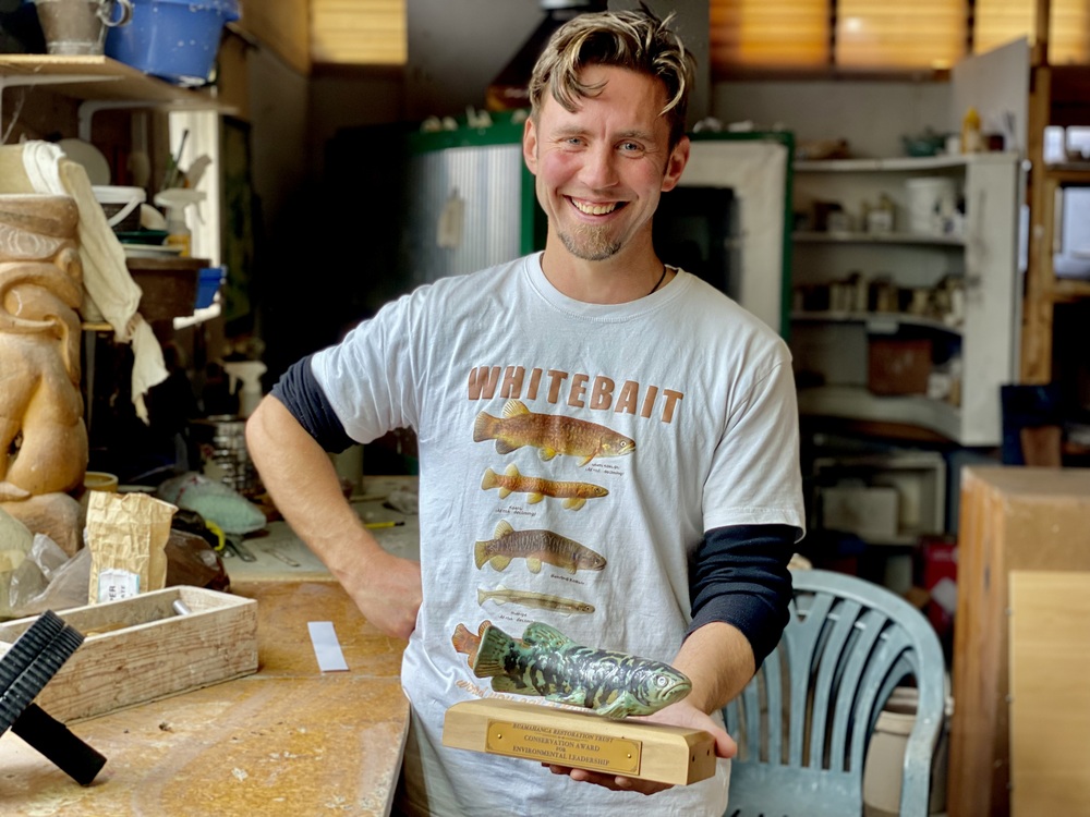 Sam Ludden with the Ruamahanga Restoration Trust Trophy Award