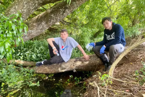 Two Rathkeale College students using a Wilderlab eDNA testing kit